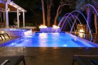 Illuminating Your Poolside: The Role of Pool Light Electricians in Creating Safe and Stunning Outdoor Spaces